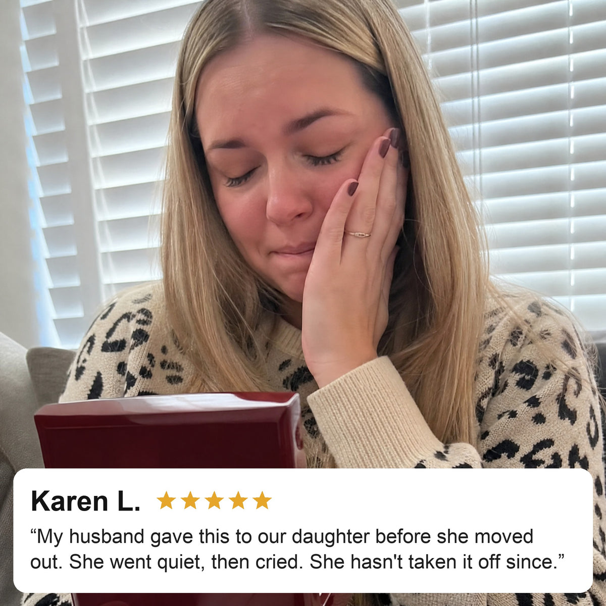 Customer review photo — daughter reading the message card